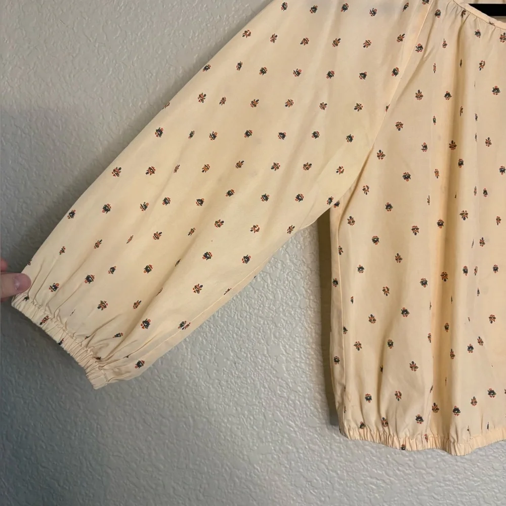 Madewell Floral cream colored puff sleeve and hem top